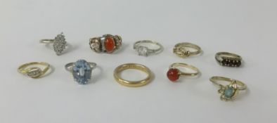 A 22ct wedding band (8.2gms), two 14ct dress rings (5.70gms) and various unmarked dress rings (