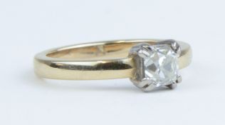 An 18ct single stone diamond ring, white gold claw setting, one old cut set with an old cut