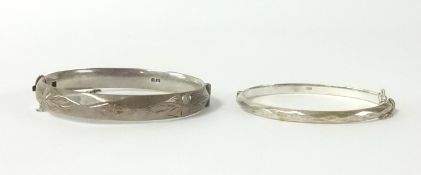 Two silver bangles, approx 61gms.