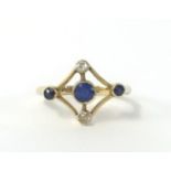 A sapphire and diamond ring, size J.