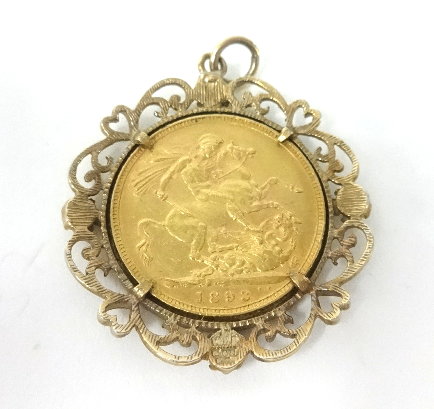 A Victoria 1893 gold sovereign set in a 9ct decorative pendant, marked 'WJP'. - Image 2 of 2