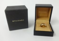 Bvlgari, an 18ct gold band ring, size M, approx 13gms, with box and outer box.