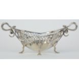 A silver and pierced bon bon dish marked 'RMEH' with snake scroll handles, approx 5.15oz.