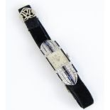 An art deco style fine vintage diamond cocktail watch set in platinum by Tavannes, fitted with a