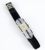 An art deco style fine vintage diamond cocktail watch set in platinum by Tavannes, fitted with a