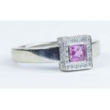 An 18ct pink sapphire ring, size N.