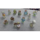 A collection of twelve Beswick Beatrix Potter figures including Hunca Munca, Tom Kitten, Little