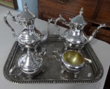 Four piece silver plated tea service marked 'Rodgers' together with a silver plated tray.