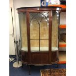 An Edwardian mahogany and inlaid display cabinet, height 179cm.