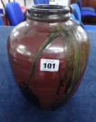 An art pottery studio vase, height 25cm, marked TM.