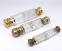 Three double end scent bottles including Victorian silver and gilt mounted.