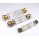 Three double end scent bottles including Victorian silver and gilt mounted.