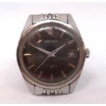 Seiko, a gents 1970's stainless steel wristwatch with calendar black dial, 17 jewels.