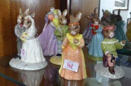 Royal Doulton Bunnykins figures (5) together with a Coalport figure.