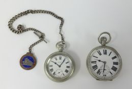 A Goliath type, nickel pocket watch with Roman numerals together with a railway watch marked on