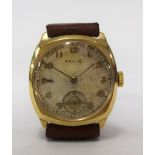 Revue, a vintage gents 9ct gold cushion cased wristwatch with inscription on reverse.