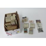 A collection of various cigarette cards including albums of Wills and Players.