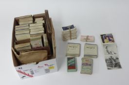 A collection of various cigarette cards including albums of Wills and Players.