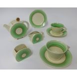 Clarice Cliff, Bon Jour, three piece tea set, two cups, two saucers and side plate.
