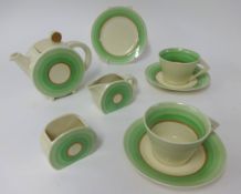 Clarice Cliff, Bon Jour, three piece tea set, two cups, two saucers and side plate.