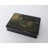 A black lacquered box, lid decorated with woodland landscape scene, indistinctly signed, possibly