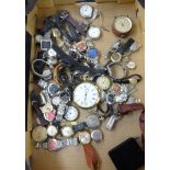 Large collection of various pocket watches and wrist watches.