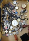 Large collection of various pocket watches and wrist watches.