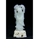 An antique Chinese white jade carving of standing robed figure on a ivory base carved with Lingzi