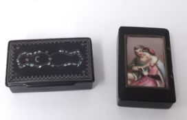 A lacquered box set with a porcelain panel depicting a romantic couple together with a 19th