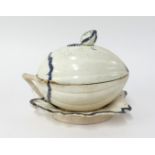 A 19th century Staffordshire pottery tureen modelled in the form of a melon on a leaf, no marks,