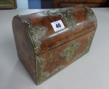 A Victorian walnut and ornate brass mounted dome top box, height 16cm.