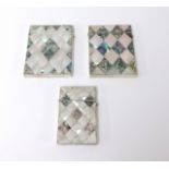 Three mother of pearl and abalone card cases.