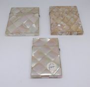 Three mother of pearl card cases.