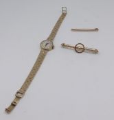 Rone, a ladies 9ct wristwatch, approx 21.30g, a 15ct brooch, 3.30g and a 9ct tie pin.