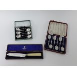 A set of six Geo V silver teaspoons in the antique style maker 'SM', cased, cased knife with