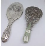 A Chinese pale jade silver on copper hand mirror together with an English hallmark silver and