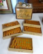 A Mahjong set (Singapore) in a carved wooden box with dragon handle.