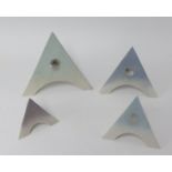 Mary White (1926-2013), four piece pyramid set, in various colours, matt, the tallest 19cm,