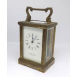 J.W. Benson, London, a brass cased carriage clock.