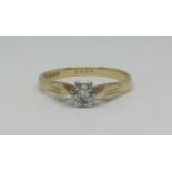 An 18ct illusion set diamond solitaire ring, approx 2.80g.