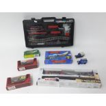 Three battery train sets inc. rail road and also some Models of Yesteryear.