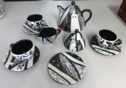 South African Trizia Studio pottery tea service 2003, teapot, cream jug, sugar bowl, three cups