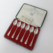 A set of six silver teaspoons, old English pattern, jubilee silver 1935, cased, each marked