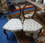 A set of four Victorian balloon back dining chairs, two other Victorian dining chairs and a foot