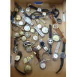Collection of various pocket watches and wristwatches.