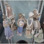 Four Nao porcelain figures, two Lladro figures and an unmarked figure of a young man with lambs. (