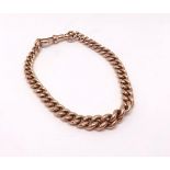 A 9ct curb link bracelet approx 23.8gms.