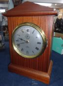 Modern Sewills R.A.F mantle clock together with eight various Military books.