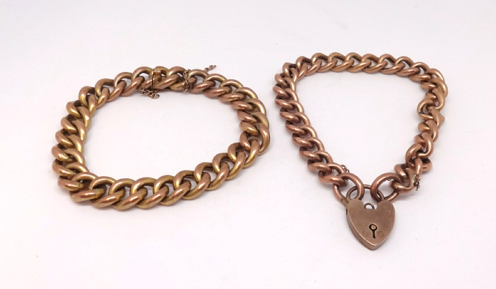 A 9ct gold bracelet with padlock (16.70g) together with a mixed colour y/m bracelet marked 9c? (17.