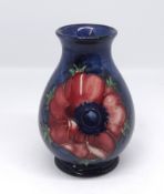 Moorcroft, small baluster shaped vase, height 9cm.